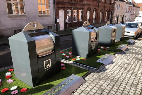 Forsøg med blomstertæpper skal bekæmpe affald på gaden